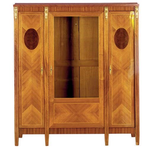 A FRENCH GILT-METAL MOUNTED MAHOGANY AND TUPLIPWOOD LIBRARY CABINET,
