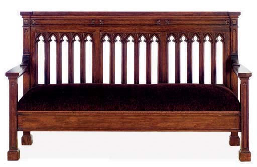 A GOTHIC REVIVAL CARVED AND STAINED OAK BENCH,