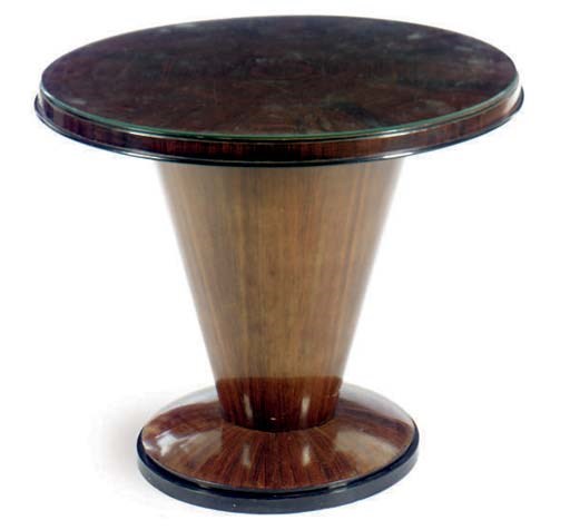 AN ART DECO ROSEWOOD AND EBONISED CIRCULAR LOW TABLE**,