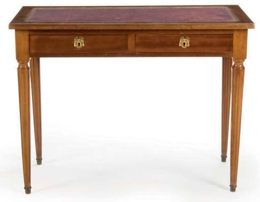 A FRENCH WALNUT TOOLED LEATHER TOPPED WRITING TABLE,