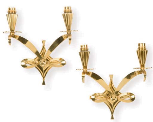 A SET OF FOUR POLISHED BRONZE TWO-LIGHT WALL APPLIQUES,