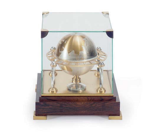 A GILT METAL GLOBE CLOCK IN CASE,