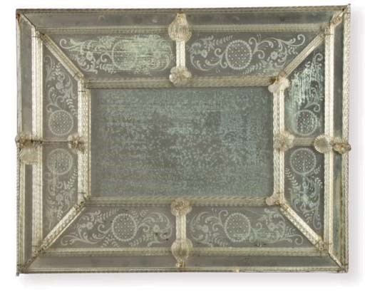 A VENETIAN ETCHED GLASS MIRROR,