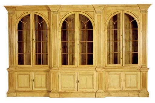 A VICTORIAN PINE BREAKFRONT BOOKCASE,