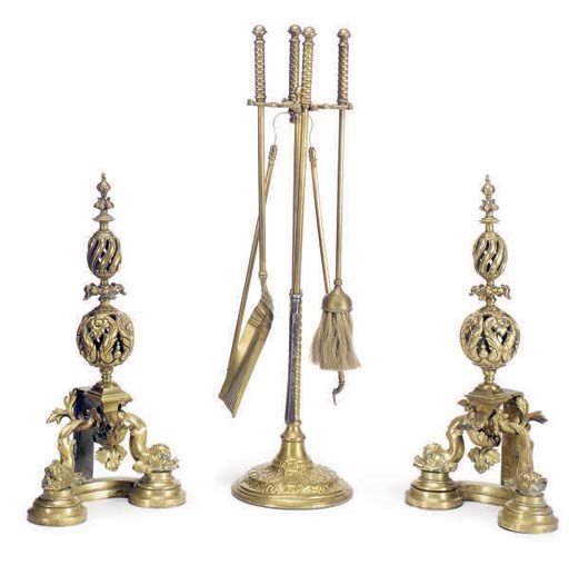 A PAIR OF BRASS ANDIRONS WITH FIRETOOLS AND STAND,