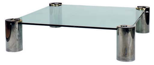 A MASSIVE GLASS AND SILVERED METAL LOW TABLE,