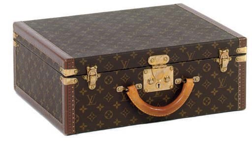 A LOUIS VUITTON MONOGRAMED SUITCASE,
