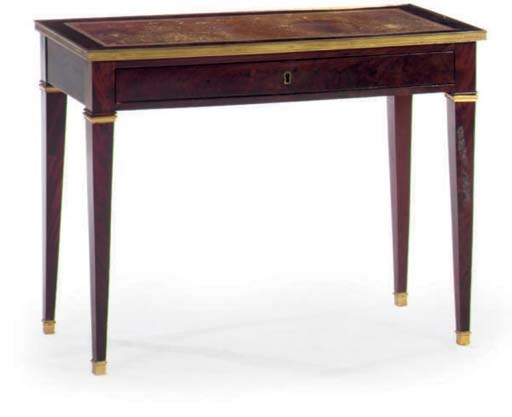 A LOUIS PHILLIPE GILT-METAL MOUNTED MAHOGANY WRITING TABLE,