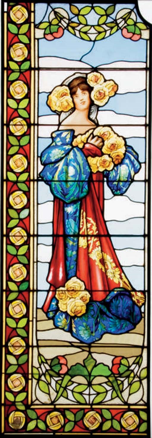 A PAIR OF STAINED GLASS WINDOWS,