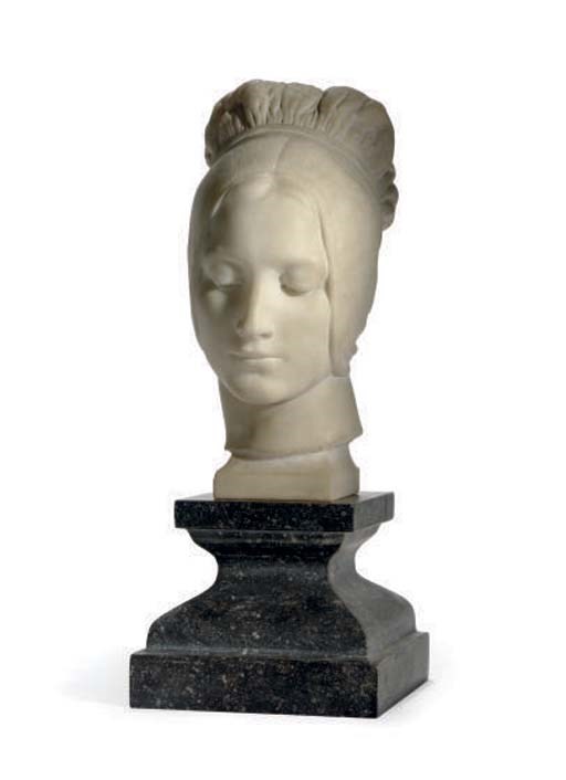 A WHITE MARBLE BUST OF A WOMAN,