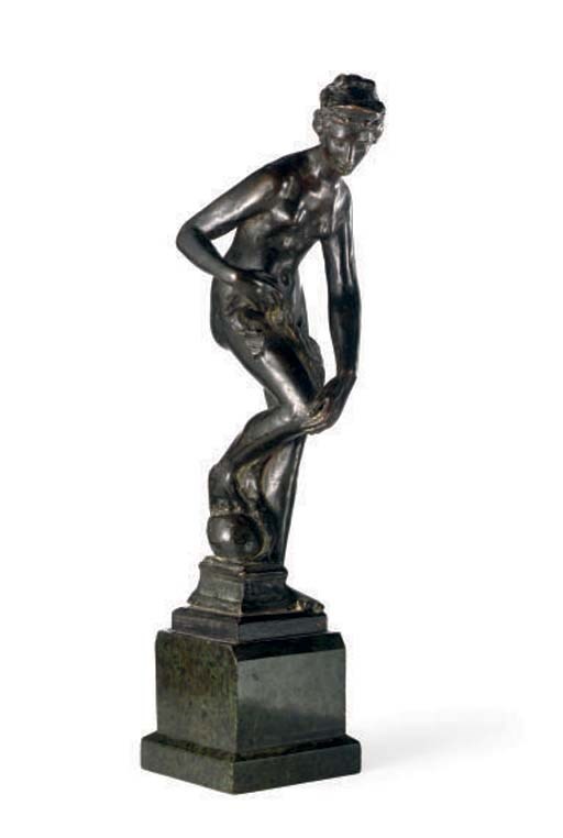 A BRONZE FIGURE OF A BATHING WOMAN,
