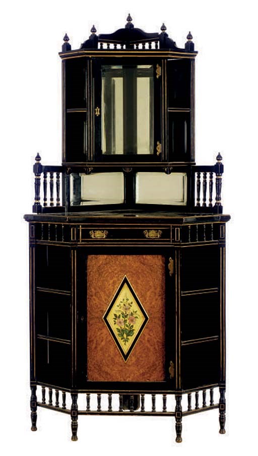 AN ENGLISH POLYCHROME DECORATED EBONIZED AND BURR ELM CORNER CUPBOARD,