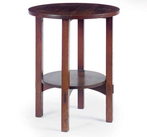 AN OAK CIRCULAR OCCASIONAL TABLE,