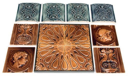 A GROUP OF NINETEEN 'CELTIC' TILES,