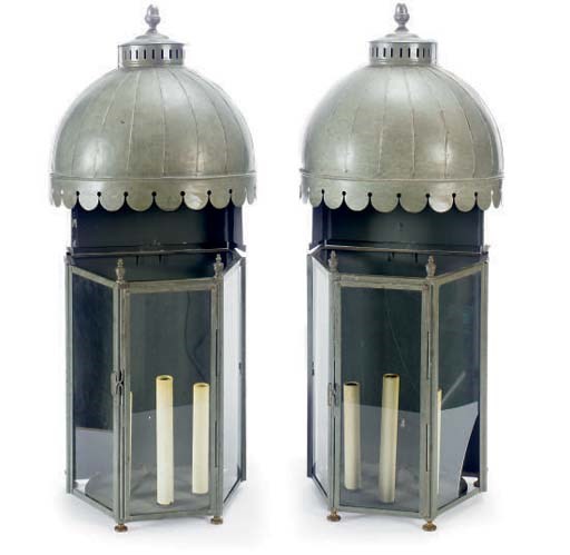 A PAIR OF METAL AND GLASS LANTERS,