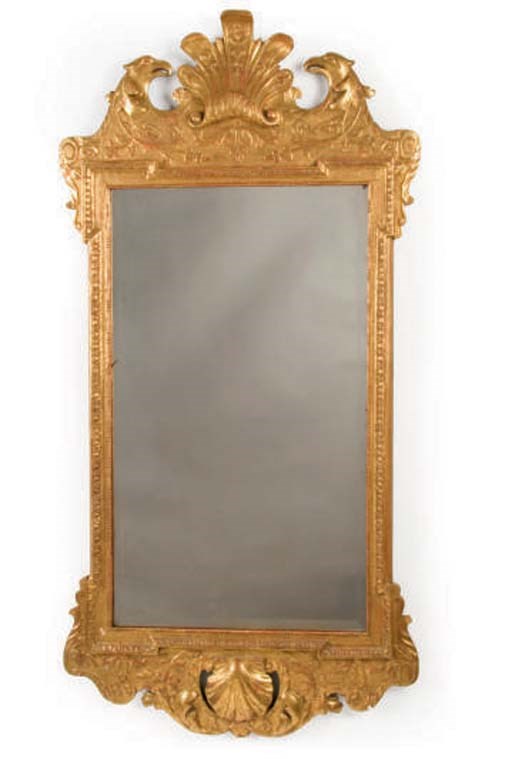 AN ENGLISH GILTWOOD MIRROR,