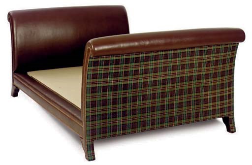 AN OVER-SIZED LEATHER AND TARTAN UPHOLSTERED BEDFRAME,
