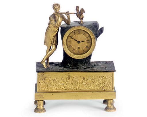 A CHARLES X GILT-BRONZE CLOCK,