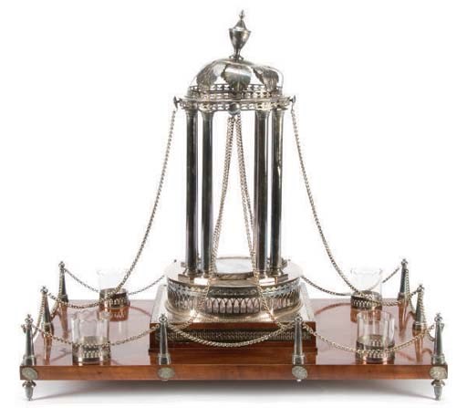 A SILVER PLATED MAHOGANY PLATFORM CENTERPIECE,