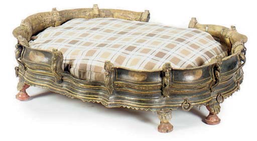 A PAINTED AND CARVED WOOD LIT AU CHIEN WITH CUSHION,