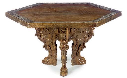AN ITALIAN CARVED WALNUT CENTRE TABLE,