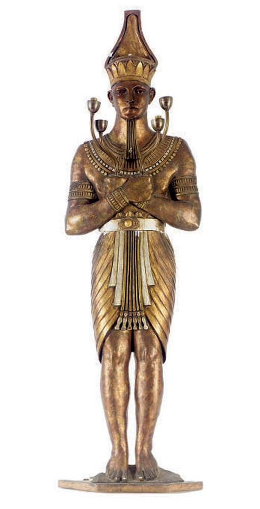 A LIFE-SIZE CARVED LAMP IN THE FORM OF AN EGYPTIAN PHAROPH,