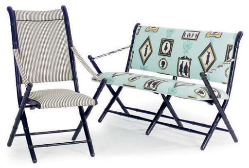 AN EBONISED AND FAUX BAMBOO GARDEN SETTEE,
