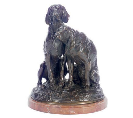A BRONZE SCULPTURE OF TWO SEATED DOGS,