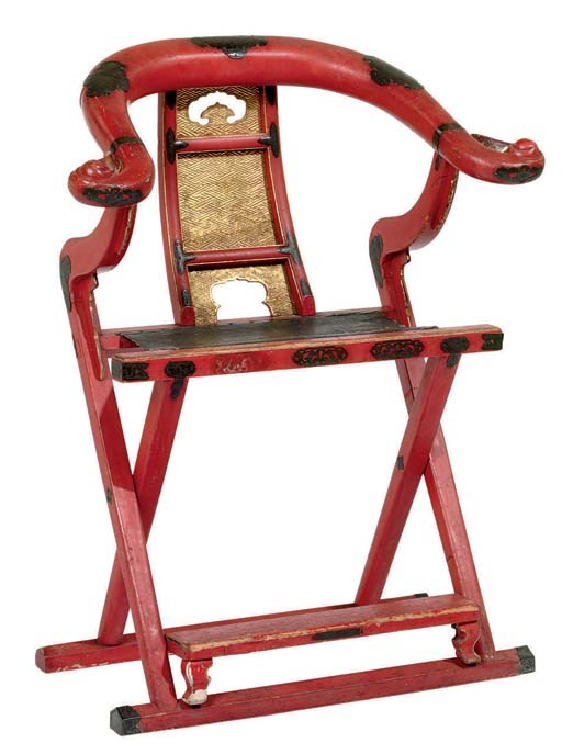 A JAPANESE GILT-DECORATED RED-LACQUERED FOLDING CHAIR