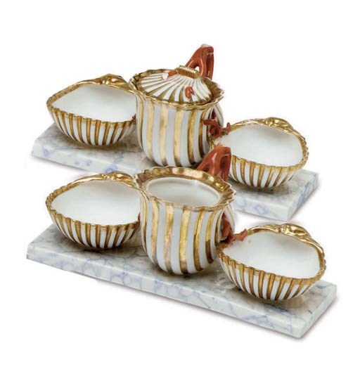 A PAIR OF PARIS (HONORE) PORCELAIN CONDIMENT STANDS