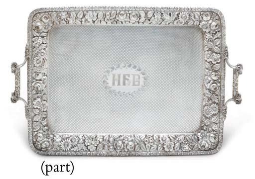 A GROUP OF FOUR SILVER SERVING TRAYS