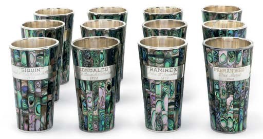 A SET OF TWELVE SILVER AND MOTHER OF PEARL TUMBLERS OF HORSE RACING INTEREST