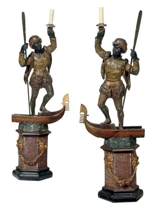 A pair of Venetian parcel-gilt, polychrome-decorated and ebonized blackamoor torcheres