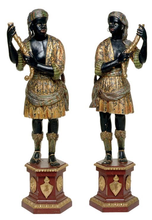 A pair of Venetian parcel-gilt, polychrome-decorated and ebonised blackamoor torcheres