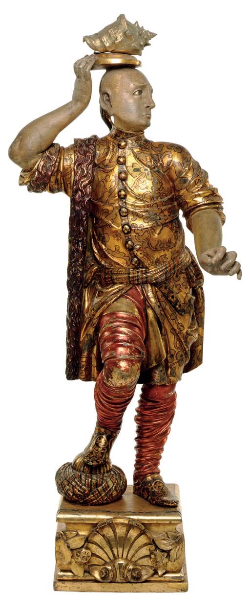 AN ITALIAN POLYCHROME-PAINTED AND PARCEL GILT FIGURE OF A MOOR