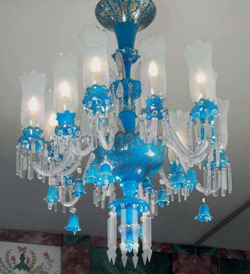 A French parcel-gilt turquoise and clear cut glass twelve-light chandelier