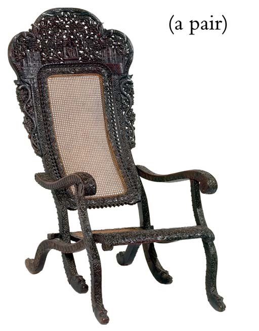 A PAIR OF ANGLO-INDIAN CARVED HARDWOOD DECK CHAIRS
