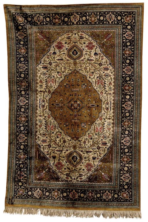 A SILK QUM RUG