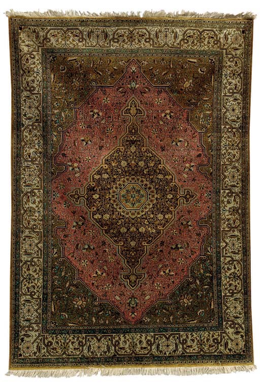 A SILK QUM RUG