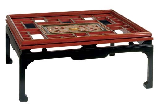 A CHINESE SCARLET AND BLACK LACQUERED PANEL