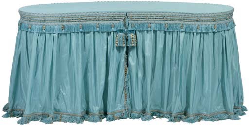 A MODERN BLUE SILK TAFFETA AND PASSEMENTERIE-APPLIED GLASS TOPPED KIDNEY-FORM DRESSING TABLE