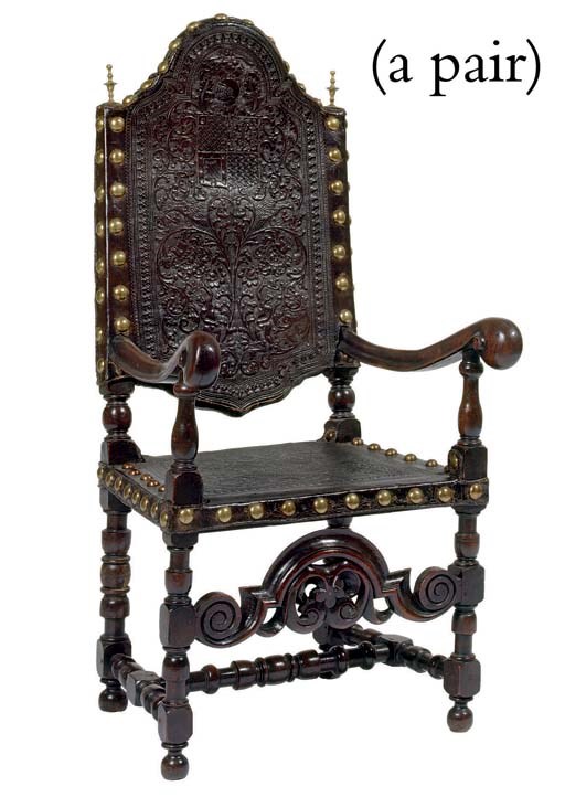 A PAIR OF SPANISH WALNUT AND TOOLED-LEATHER ARMCHAIRS