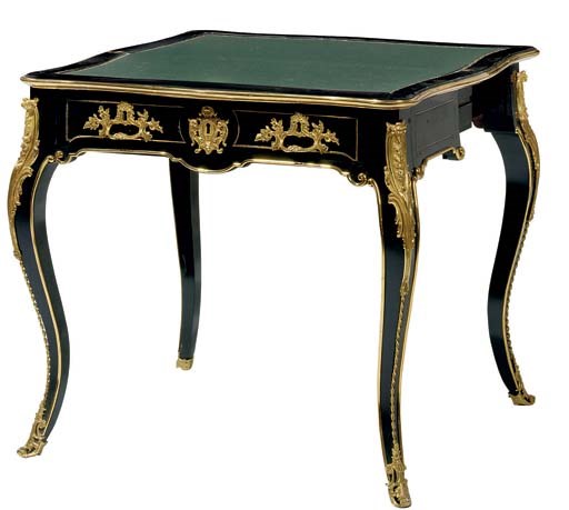 A FRENCH EBONIZED AND GILT-BRASS AND ORMOLU GAMES TABLE