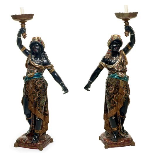 A pair of Venetian parcel-gilt, polychrome-decorated and ebonized blackamoor torcheres