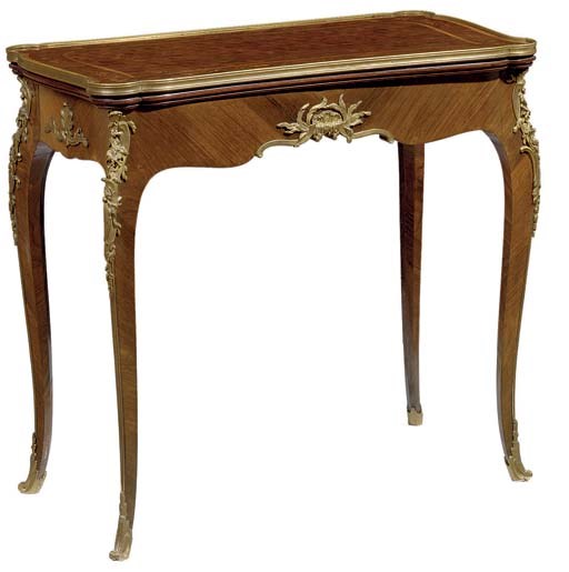 A Louis XV style ormolu-mounted kingwood, marquetry and parquetry games-table