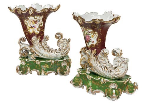 A PAIR OF JACOB PETIT PORCELAIN CLARET AND APPLE-GREEN GROUND VASES ON FIXED STANDS
