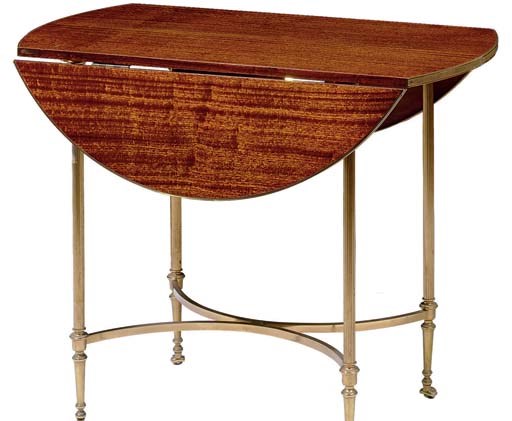 A MAHOGANY AND GILT-BRASS DROP-LEAF TABLE
