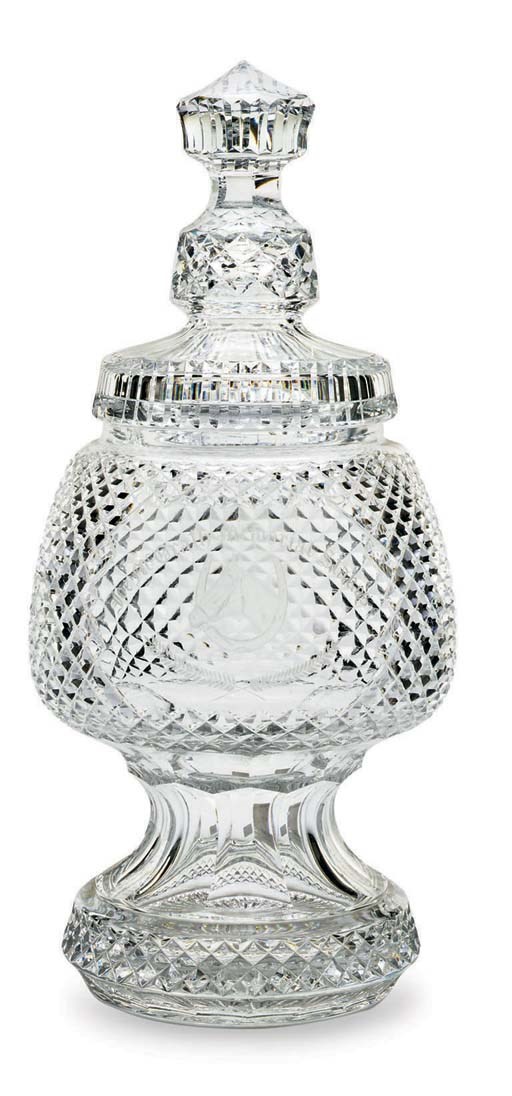 A WATERFORD CUT-GLASS FOOTED TROPHY BOWL AND COVER