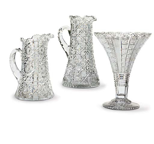 TWO AMERICAN BRILLIANT CUT GLASS TALL EWERS AND A CUT GLASS VASE