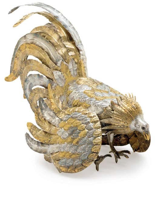 A MEXICAN PARCEL-GILT SILVER COCKEREL-FORM TABLE ORNAMENT